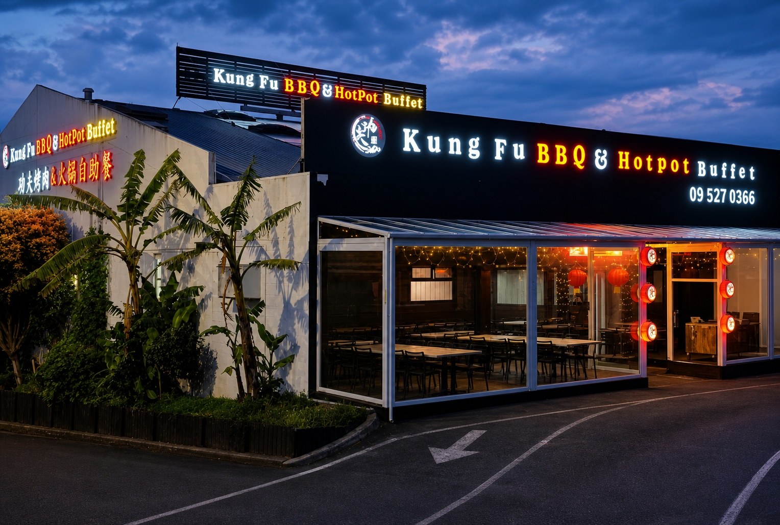 Kung Fu BBQ & Hotpot Buffet lit up at dusk on Pleasant View Road, Panmure